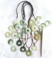 Jade circle pendant,  ကျောက်စိမ်း အဝိုင်းပုံဆွဲသီး၊. 