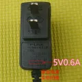TPLink Adapter 5V 0.6A (Small head). 
