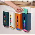 Wall-mounted garbage bag storage box. 