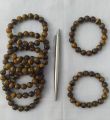 Tiger's eye bracelet 10 mm size,  တိုက်ဂါးအိုင်း လက်ပတ် ၁၀ ဆိုက်၊. 