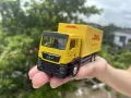 Diecast Metal MAN DHL Delivery Truck (1:64). 