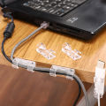 Transparent Plastic Cable Organizer Clips. 