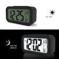 Smart Optical Control LCD Clock with Automatic Sensor Backlight, Snooze Alarm, Date and Temperature for Home and Office. 