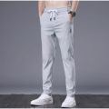 Summer Ice Silk Pants Men's Trousers Slim-fit Elastic Thin Korean Style Fashionable Japanese Style New Trendy Brand Casual Pants Cross-Border. 