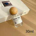 High-End Perfume Bottle Elegant Design 30ml 50ml Glass Spray Bottle Large Capacity Wooden Cap Replacement Bottle for. 