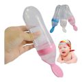 Baby Spoon Feeder Squirt Bottle (Color may vary). 