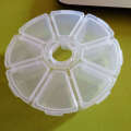 Small Round Plastic Box with 8 Grids Compartments for Storing Jewelry, Beads, Screws, and Small Parts (10*2.7 CM). 