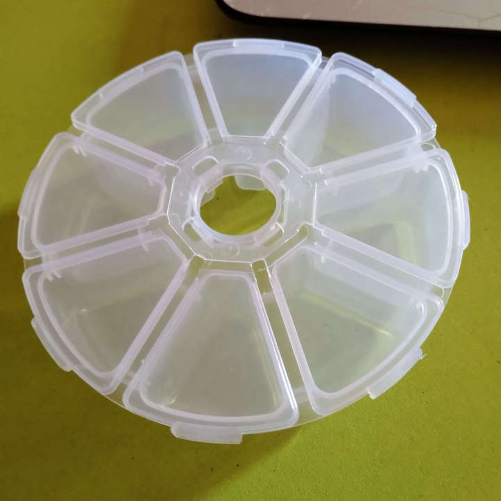 Small%20Round%20Plastic%20Box%20with%208%20Grids%20Compartments%20for%20Storing%20Jewelry,%20Beads,%20Screws,%20and%20Small%20Parts%20(10*2.7%20CM)%20-%20Image%202