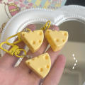 Mini size Cheese keychain Unique Resin Student girl Jewelry pendant Durable material Sweet Imitation food play pendant for Backpack decoration. 
