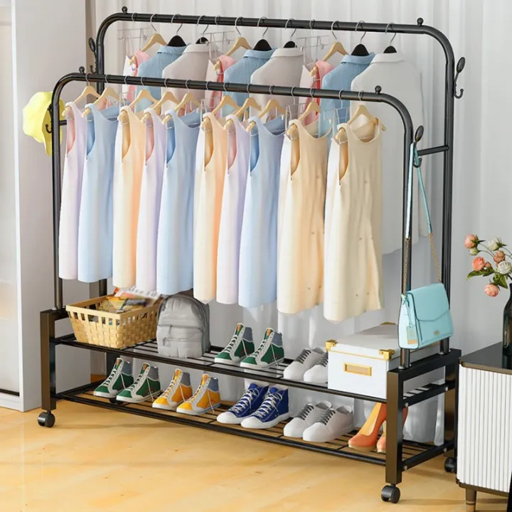 Heavy-Duty%20Metal%20Garment%20Rack%20%E2%80%93%20Double%20Rod,%20Storage%20Shelf%20&%20Hooks,%20Portable%20Clothes%20Organizer%20with%20Rollers%20%7C%20Cloth%20Hanger%20%7C%20Hanger%20-%20Image%204