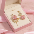 Pink Crystal Rose Asymmetric Drop Earrings. 