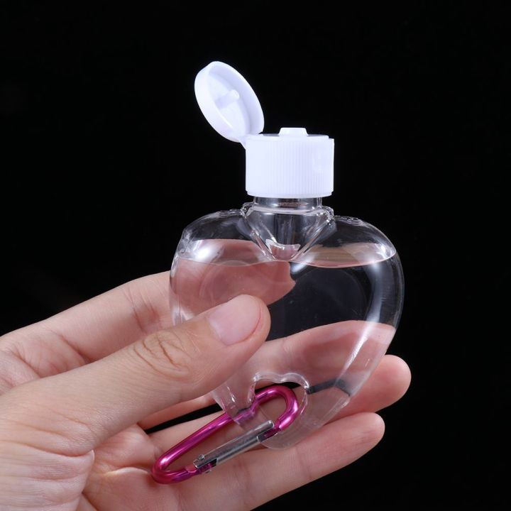 Special%20Offer%2050ml%20Transparent%20Alcohol%20Perfume%20Leaf%20Heart%20Spray%20Bottle%20Empty%20Container%20Bottle%20With%20Metal%20Hook%20Lotion%20Jar%20-%20Image%204