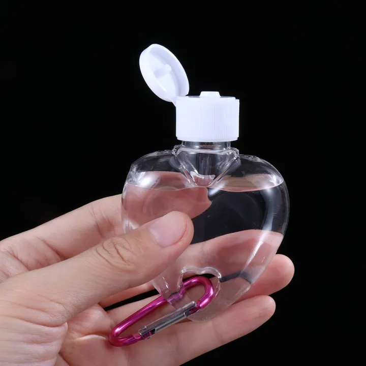 Special%20Offer%2050ml%20Transparent%20Alcohol%20Perfume%20Leaf%20Heart%20Spray%20Bottle%20Empty%20Container%20Bottle%20With%20Metal%20Hook%20Lotion%20Jar%20-%20Image%204