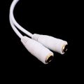 Cable splitter of white earphones 3.5 mm audio. 