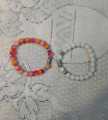 White Beads and Pink Colored Marble Couple Bracelets. 