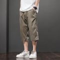 Casual pants men's 2025 summer thin ice silk sports cropped pants trendy brand loose casual shorts. 