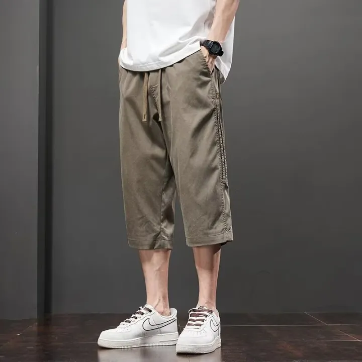 Casual%20pants%20men's%202025%20summer%20thin%20ice%20silk%20sports%20cropped%20pants%20trendy%20brand%20loose%20casual%20shorts%20-%20Image%205
