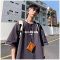 HOT 8XL Loose T-shirt Fashionable Trendy American Letter DAN Print T-shirt with Soft Comfortable Casual Men Versatile Couple Outfit. 