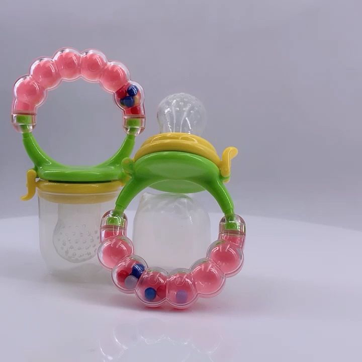 Silicone%20Baby%20Pacifier%20&%20Fruit%20Feeder%20%E2%80%93%20BPA-Free%20Teething%20Toy%20&%20Gum%20Massager%20for%20Infants%20%7C%20Nibbler%20for%20Baby%20Food,%20Fruits%20&%20Vegetables%20-%20Image%209