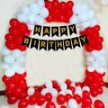 Happy Birthday Banner with Red & white balloons. 