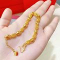 Sand gold jewelry light luxury high-end hollow transfer bead exquisite bracelet women's design sense simulated gold hand jewelry wholesale. 
