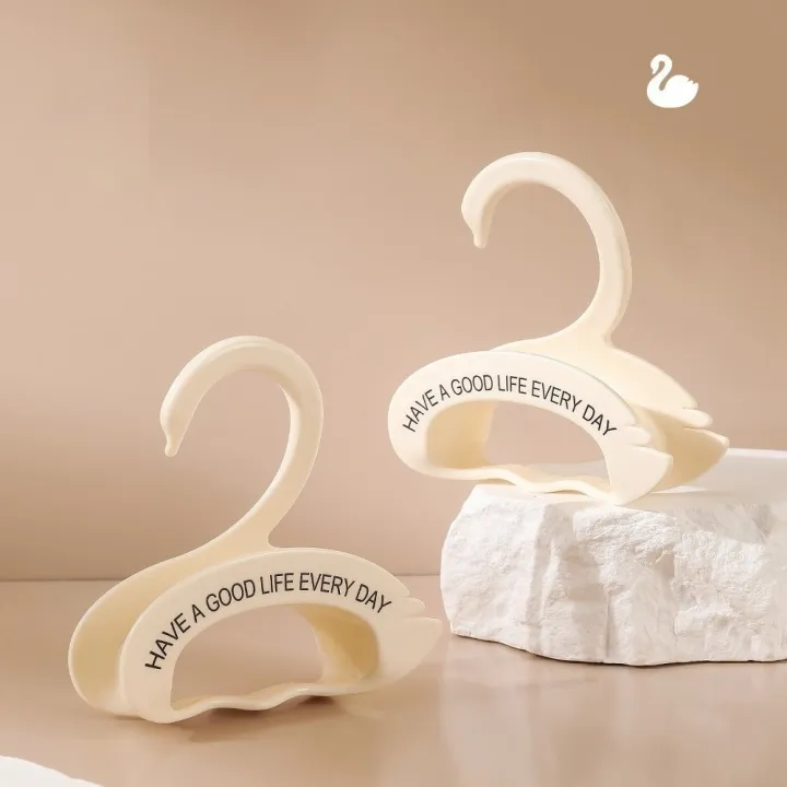 New%20Cute%20Swan%20Shaped%20Handbag%20Hangers%20Saving%20Space%20Multifunction%20Bag%20Hanger%20Hook%20Cream%20Color%20Stackable%20Clothes%20Rack%20For%20Hat%20Silk%20Scarf%20-%20Image%205