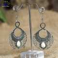 Self Patterned Ivory Stoned Dangling Earrings - Jewels of Nepal. 