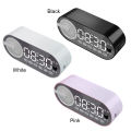 Wireless BT Speaker Small Alarm Clock with Dual Alarms Human-Activated Living Room Office Decoration. 