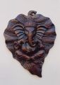 Leaf Ganesh Ceramic Wall Hanging (9 Inch). 