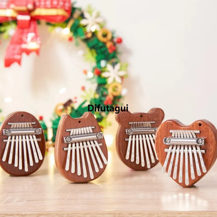 Difutagui%20Zheng%20Set%20Gift%20Portable%20Musical%20Instrument%20Drop%20Bag%20Thumb%20Kalimba%202025%20New%20Sales%20promotion%20Mini%208%20Key%20Piano%201%20Style%20Cute%20and%20Beautiful%20Kids%20-%20Image%205