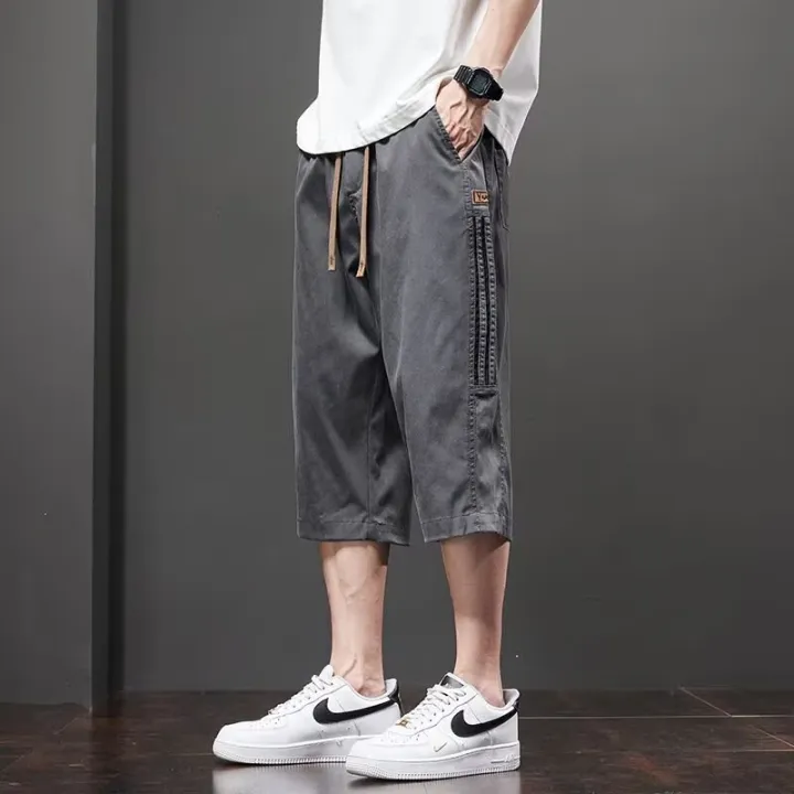Casual%20pants%20men's%202025%20summer%20thin%20ice%20silk%20sports%20cropped%20pants%20trendy%20brand%20loose%20casual%20shorts%20-%20Image%207