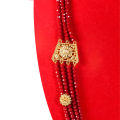 Gold Plated Panchadhatu Red Crystal Beaded Chandra Haar With Small Flowers Attached And Big Flower Design Locket For Women. 