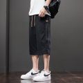 Casual pants men's 2025 summer thin ice silk sports cropped pants trendy brand loose casual shorts. 