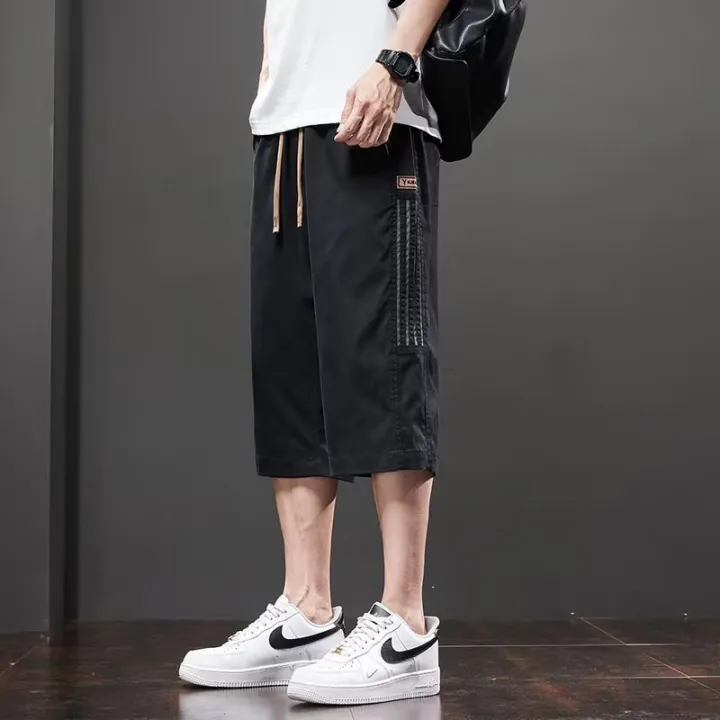 Casual%20pants%20men's%202025%20summer%20thin%20ice%20silk%20sports%20cropped%20pants%20trendy%20brand%20loose%20casual%20shorts%20-%20Image%206