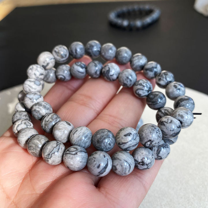 %E3%80%90Must-have%E3%80%91Jingyao%20white%20silver%20leaf%20stone%20bracelet%208mm%20smooth%20round%20beads%20gray%20white%20crystal%20single%20ring%20bracelet%20personality%20female%20girlfriends%20-%20Image%204