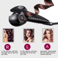 Perfect Curl Hair Curler (Automatic Curl Artifact). 