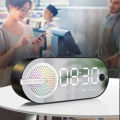 Wireless BT Speaker Small Alarm Clock with Dual Alarms Human-Activated Living Room Office Decoration. 