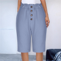 Women's solid color button casual pants Light blue XXL. 