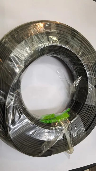 FIBER%20OPTIC%20PATCH%20CABLE%20DROP%20WIRE%20GREEN%20GREEN%20CONNECTOR%2050%20Meter%20LENGTH%20BLACK%20COLOUR%20WITH%20SUPPORT%20DROP%20WIRE%20SC/APC-SC/APC%20-%20Image%203