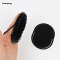 Sutuiying 1pcs silicone comb palm portable scalp massage black New style hair care travel portable brush hair styling tool. 