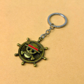 YaaNatural Catchy One Piece Anima Manga Pirate Flag Logo Wheel Rotating Metal Keychain Heavy Metal Keyring, Antique |Anime Key Ring| Perfect Keychain For Anime Lover|Cars Bikes. 