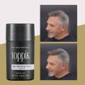 White Toppik Hair Building Fiber. 