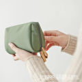 Korean version of lipstick envelope makeup bagSimple and delicate travel clutch bag, portable mini travel cosmetics storage bag. 