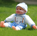 Happy Baby Toy Musical and Laughing Boy Doll. 