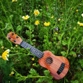 Guitar Four-string Guitar Instrument Initiation Music Toys Yukri Kids Guitar Model Toy Mini. 