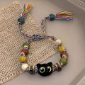 Ceramic Big Eye Cat Bracelets Fashion Adjustable Size Tassels Braided Rope Bracelet Skull Accessories Hand Jewelry Creek. 
