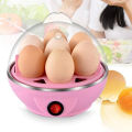 Effortlessly Cook and Steam Perfect Eggs with Electric Egg Cooker Steamer - 7 Eggs Capacity and Measuring Cup Included. 