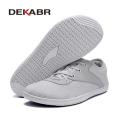 DEKABR New Couple Shoes New Style Flying Weaving Breathable Basic Lace Up Pedaling Lazy Summer Casual Sneakers. 