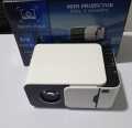T5 WiFi Mini Projector 2500 Lumens Smart Video LED Projector Home Theater White. 