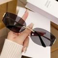 Cross-border New Frameless Miu Home Y2K Curved Sunglasses ins Women's High-End Style Hot Girl Street Style Versatile Sunglasses Wholesale. 